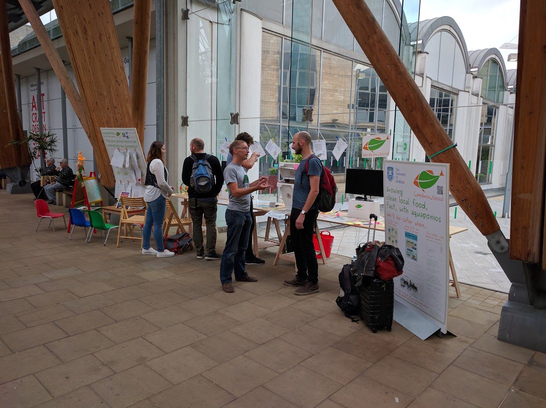 WeGrowSocial's tweet photo. Visitors @Farm_Urban &amp; @LifeSciencesUTC at Winter Garden #aquaponics Tnx for produce pod! ~500 kids have drawn fish! https://t.co/E9rIuNrYOp