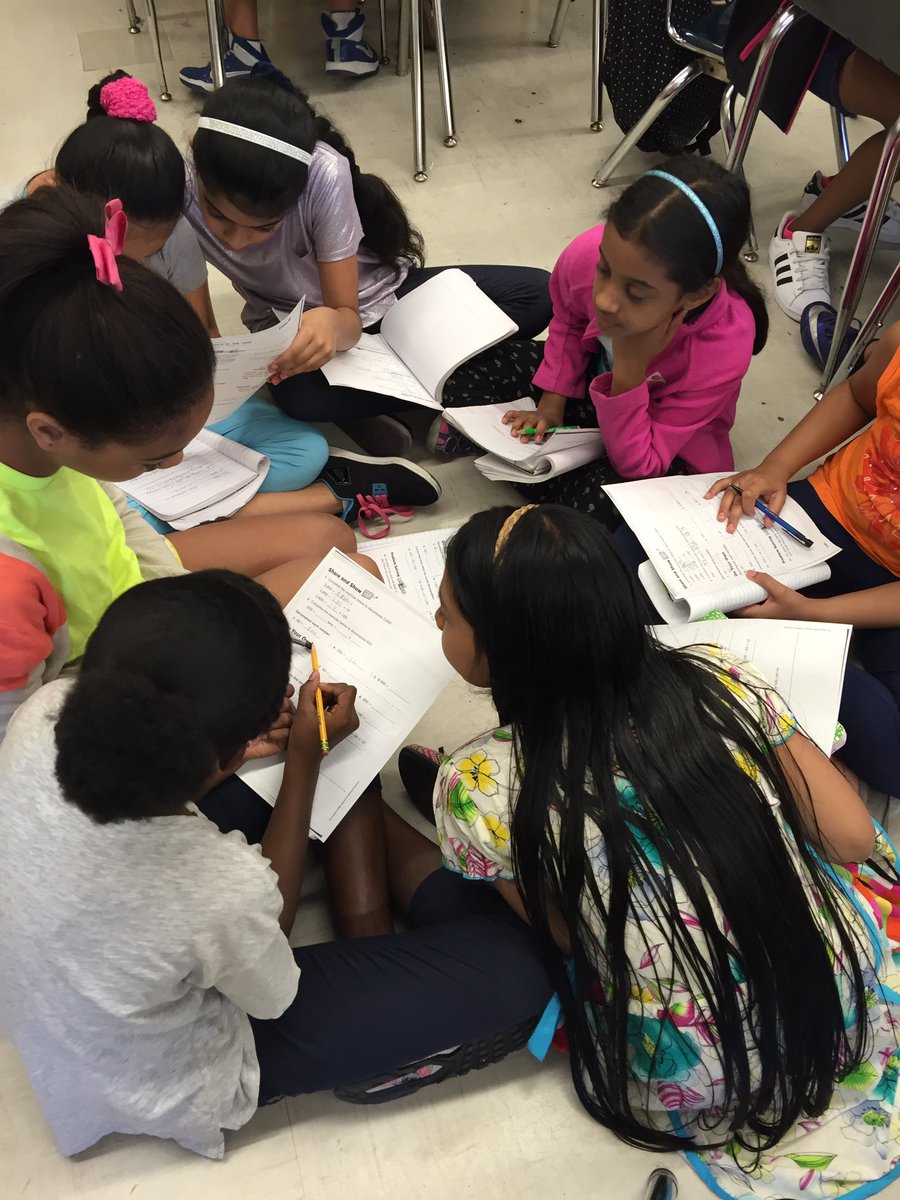 Working together to solve a math problem. #76q