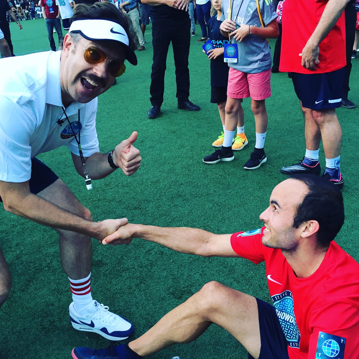 SteveNashFdn's tweet photo. Class acts: Team Red captain @landondonovan w Team White #CoachLasso (aka #JasonSudeikis) at #ShowdownNY last night: https://t.co/d97HSeTYnY