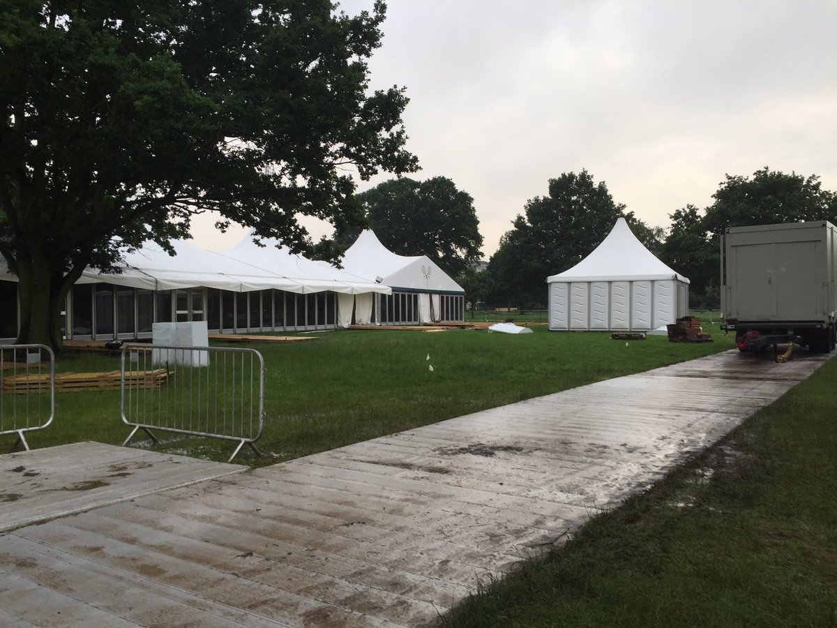 ViewpressMedia's tweet photo. A very wet and muddy Wimbledon installing RF For hospitality https://t.co/MSRtlncEOa
