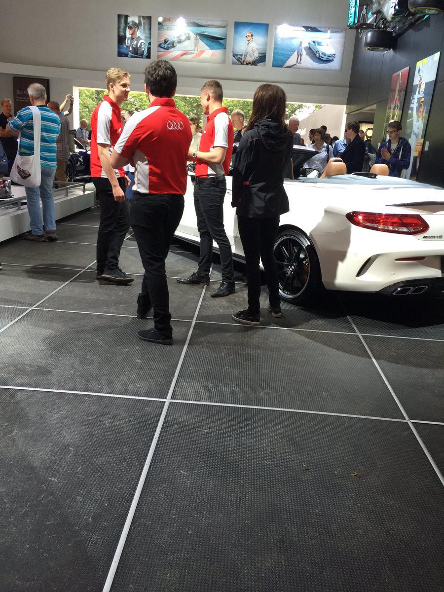 SAutopoint's tweet photo. @Audi staff couldn't resist a look at the @MercedesBenz stand today ! #foslive #goodwood #festivalofspeed #mercedes https://t.co/2aPbp0P7iF