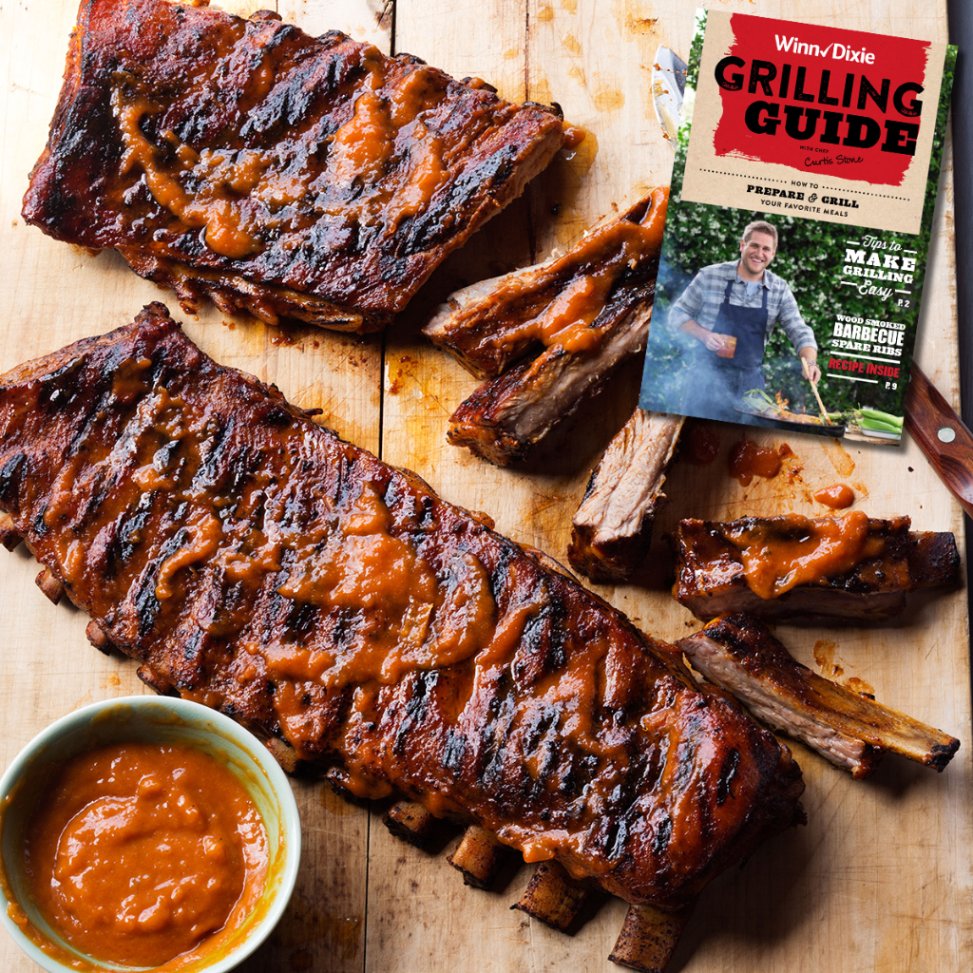 WinnDixie's tweet photo. Grab your #CookingWithCurtis #GrillingGuide and spatula for WOOD SMOKED BARBECUE SPARERIBS! https://t.co/6MVf1djIyi https://t.co/zXjXdStYD0