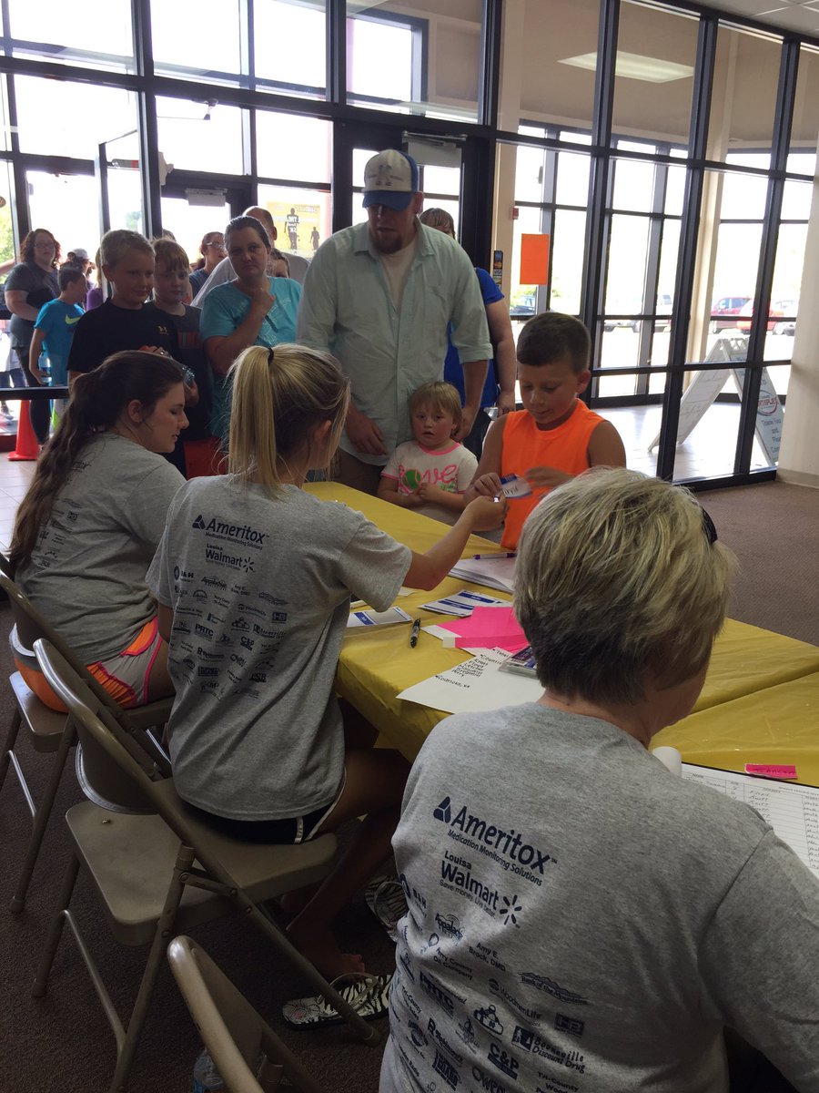 We're at <a href="/uniteky/">Operation UNITE</a> annual Shoot Hoops Not Drugs b-ball camp in Leburn, Ky. Kids lining up to come in.
