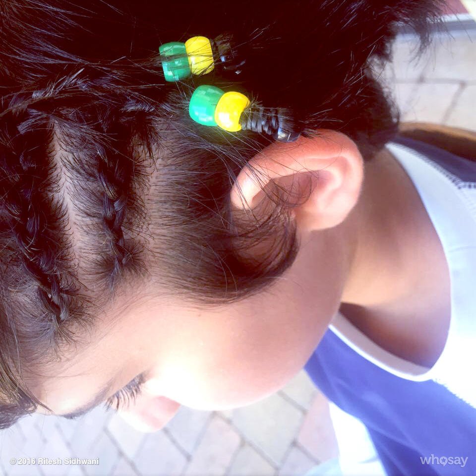 My lil rascal braided in Jamaica