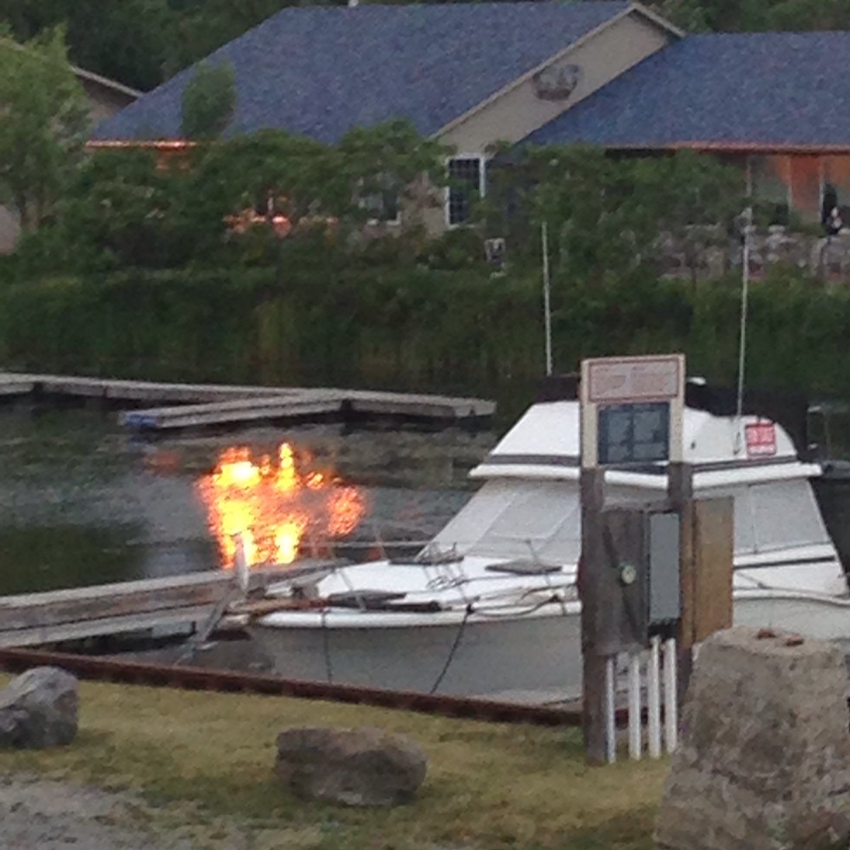 brightoncanada's tweet photo. Fire on the water, #brighton Ontario! This was actually sunlight at sunset reflecting! https://t.co/AktWKrCLZ5