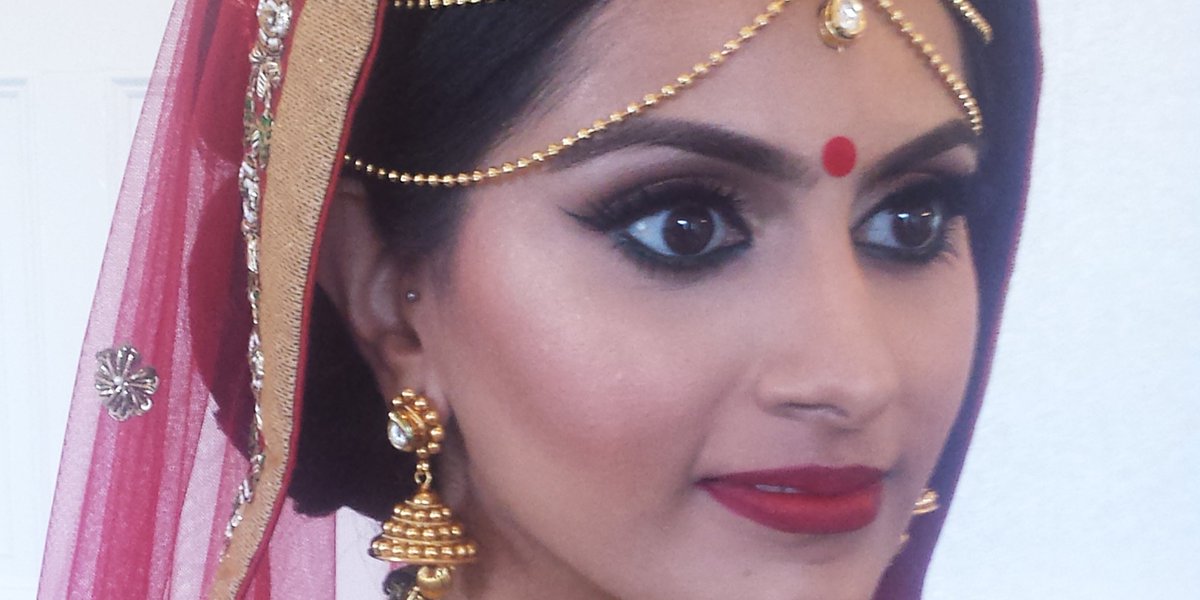Red lipped and smokey eyed, does it get more beautiful than that? #AsianMakeupArtist #RealBrides