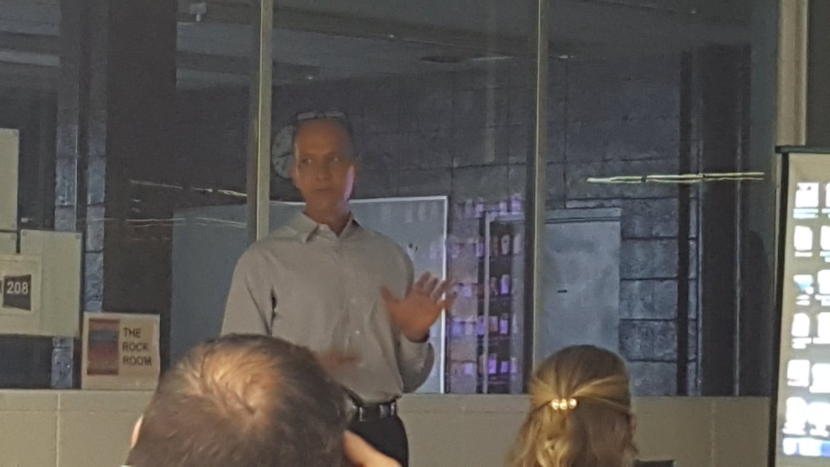 Learning from Dr. David Fries about advanced technology training at the Science Center.