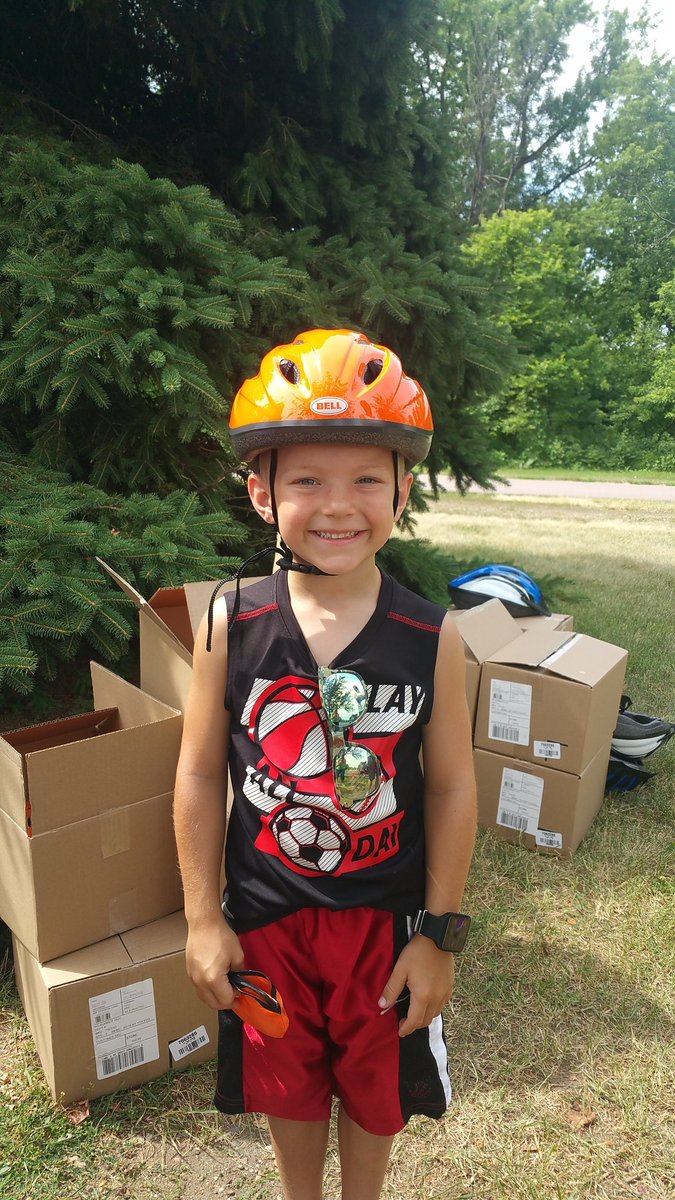 All smiles with a new helmet <a href="/TourSiouxFalls/">Tour Sioux Falls</a> happening at Cherry Rock Park and on the bike trail! #MoveWell