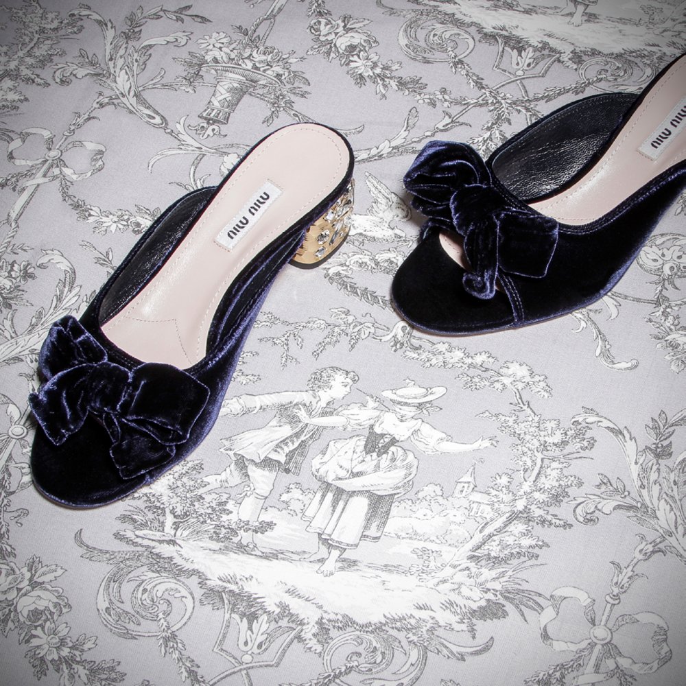 These velvet sandals are a little bit Rococo and unmistakably <a href="/MIUMIUofficial/">Miu Miu</a>-> go.mytheresa.com/4z12gm #mytheresa