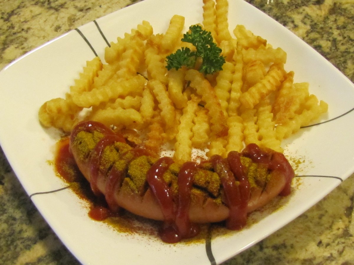 Currywurst with golden fries