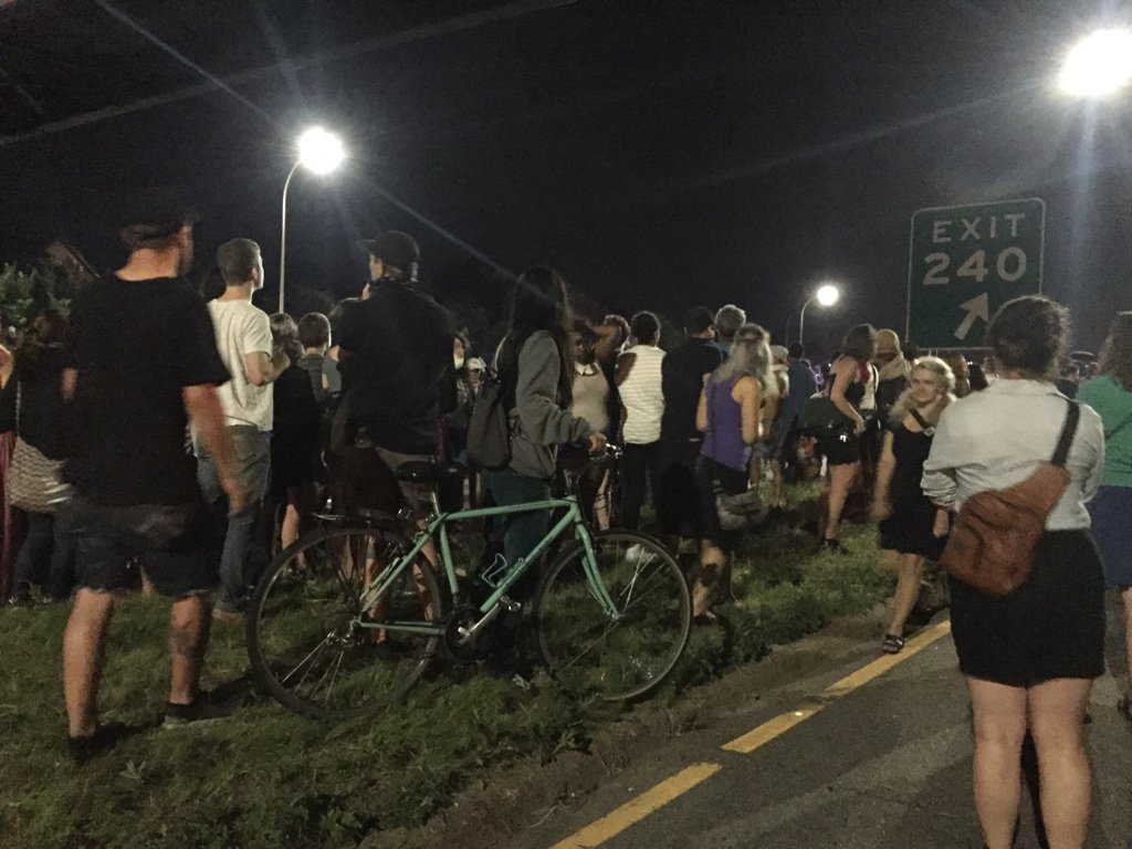 bellwak's tweet photo. Someone just threw something at police. Protesters yell “stop throwing shit!” To whom ever did it #stpaul https://t.co/hGQJPAVtTH