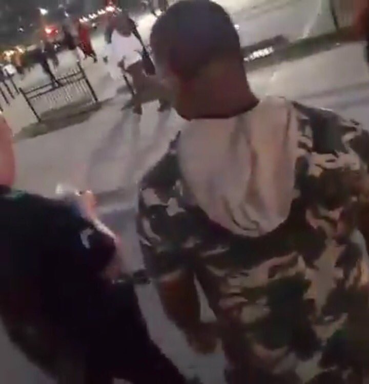 MercedezUAZ's tweet photo. : @DallasPD "person of interest" seen in Facebook vid handing rifle to officer: https://t.co/UWFQ6lAEaf #Dallas https://t.co/Q4RBnY4rCP