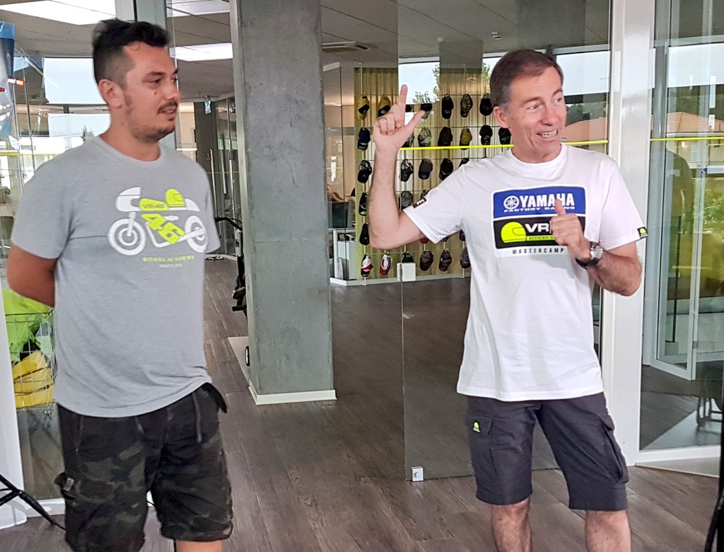 TheMasterCamp's tweet photo. Mr Jarvis explains we've come full circle. This table is where the #Yamaha #VR46 Master Camp started. #theexperience https://t.co/X8rMKo5d9M