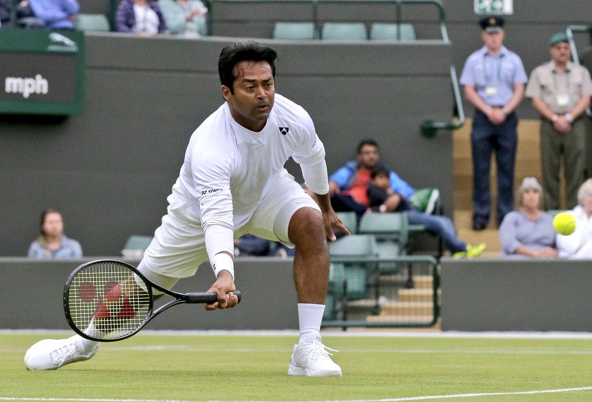 Leander's tweet photo. Grand Slam#19 will have to wait,another fun year playing @Wimbledon rolls by!Blessed to play on these Hallowed lawns https://t.co/bMY7NCoX7Z