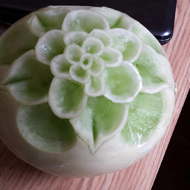 OarPaddle's tweet photo. What do chefs do on their day off?  Why - turn cantaloupes into flowers, of course!! @OarPaddle #dayoff  #foodart https://t.co/benaZeaemm