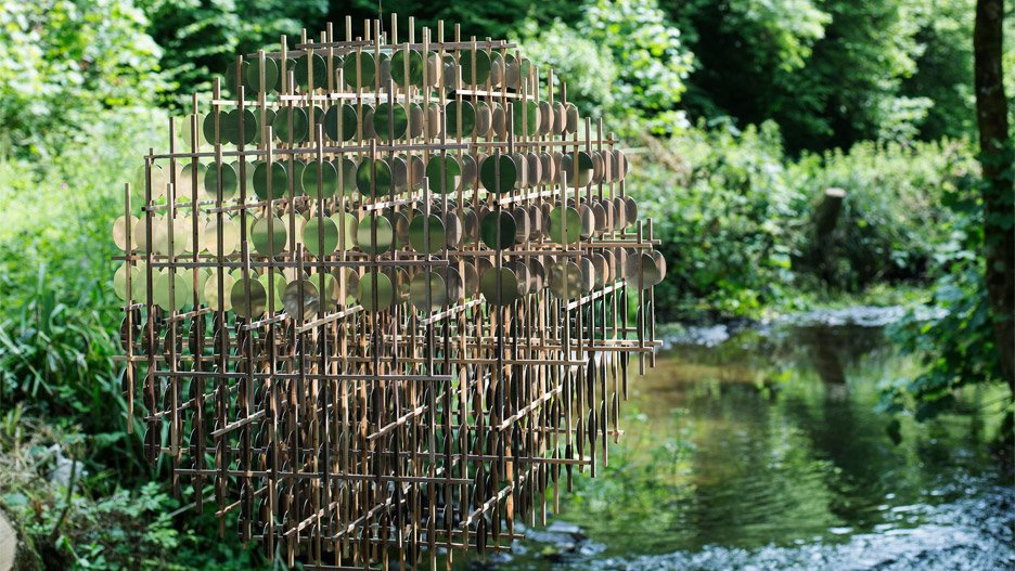 Hundreds of reflective "pennies" form this spherical sculpture: dezeen.com/?p=930695 #design
