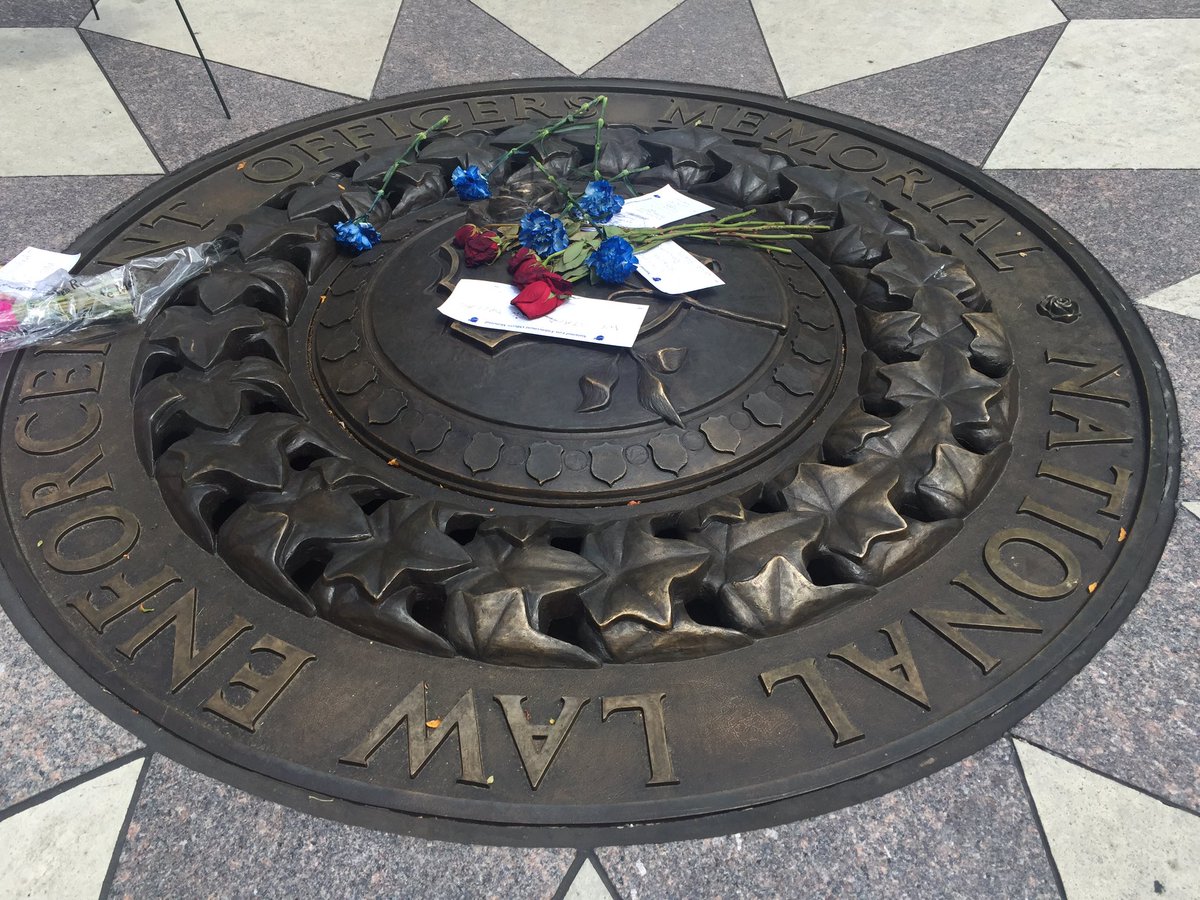 DCPoliceDept's tweet photo. Today we place flowers at the National Law Enforcement Officers Memorial for our fallen partners in Dallas https://t.co/u6mMCimRe8