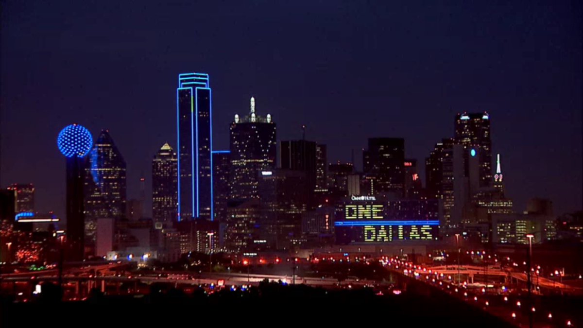 FOX4's tweet photo. The Dallas skyline honoring our men &amp; women in blue #OneDallas #DallasStrong (Pic: @rociopat) https://t.co/WIf8dKuGgq