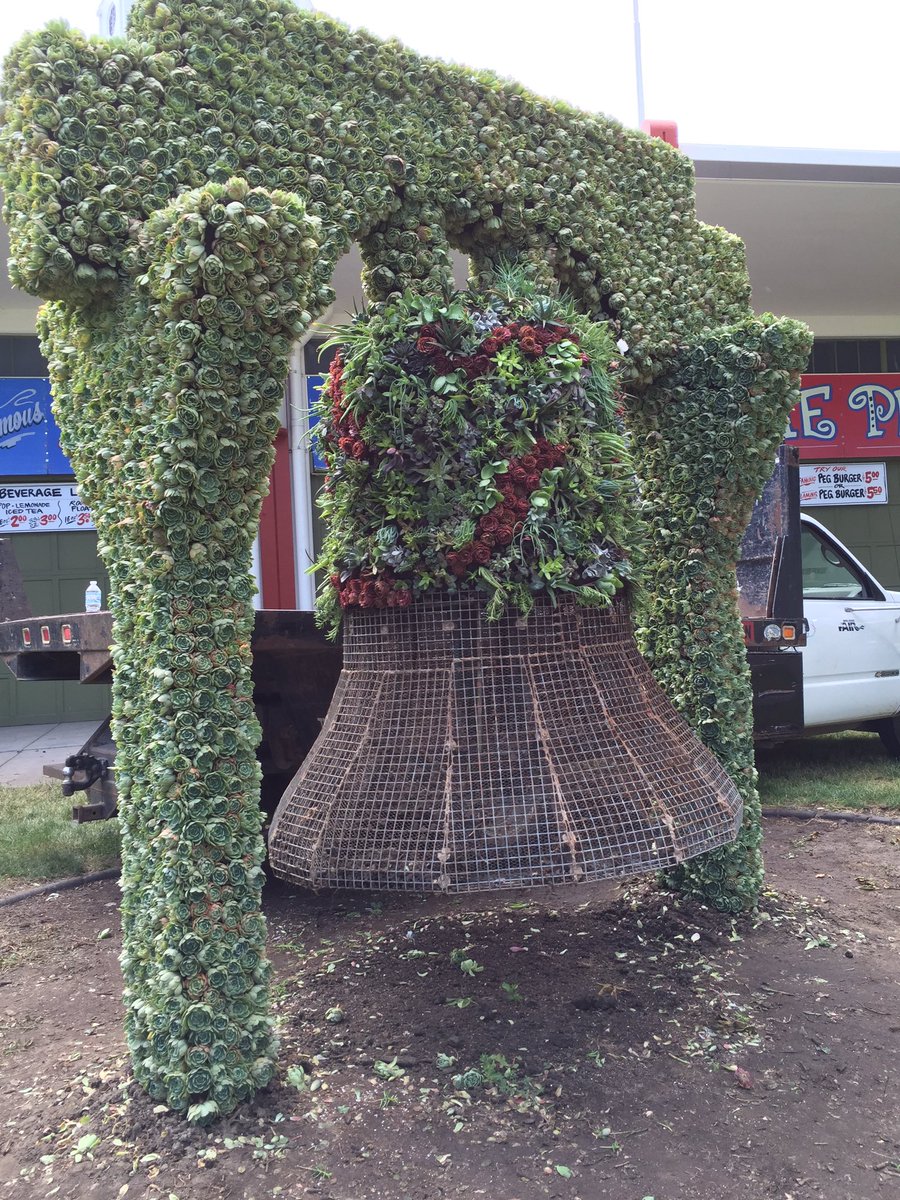 mnstatefair's tweet photo. The Liberty Bell comes to life – literally – as 100s of plants are embedded in its frame. #FairgroundsInSummer https://t.co/CAHFy5M19D