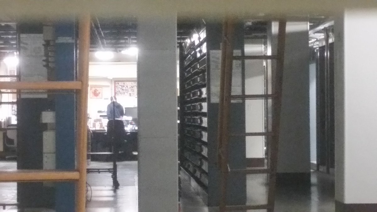 textfiles's tweet photo. The lost phone phreak in me noticed what looked like a central office, and a peek inside revealed some crossbar! https://t.co/DZn2v4bMIx