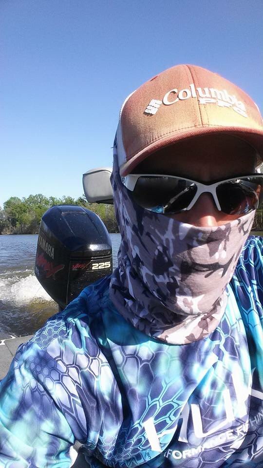 Taylor Smith rocking his buff from #apollosshield while fishing.