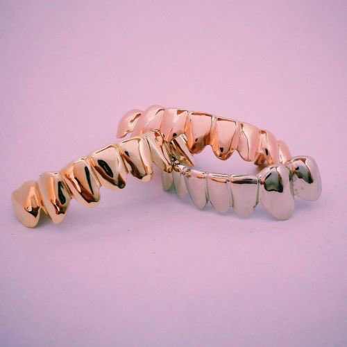 Gold and Silver Grillz
wetheplug.com