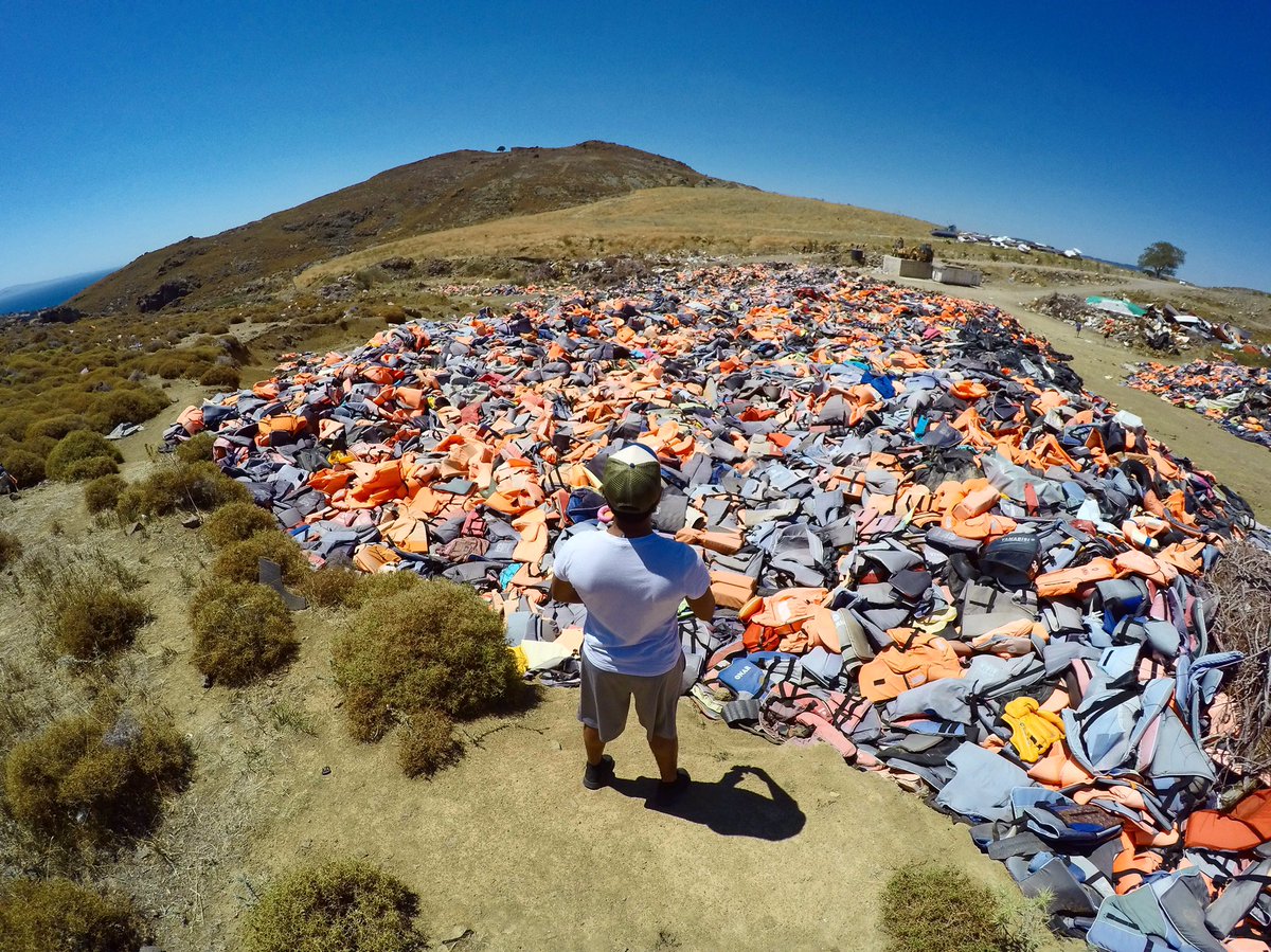 sakirkhader's tweet photo. This collection of life vests tells you what people are going through to get to Europe. https://t.co/9qGo7EDziz