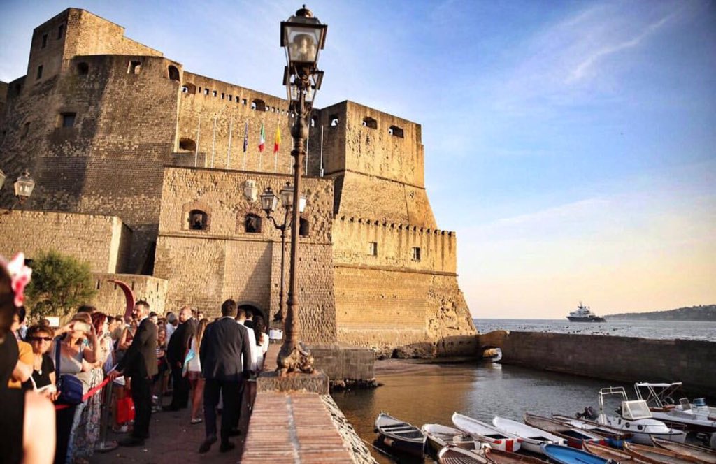 dolcegabbana's tweet photo. Castel Dell'Ovo is the grand stage of Alta Sartoria show tonight. #DGLovesNaples Thanks to Naples https://t.co/numCjYAftH