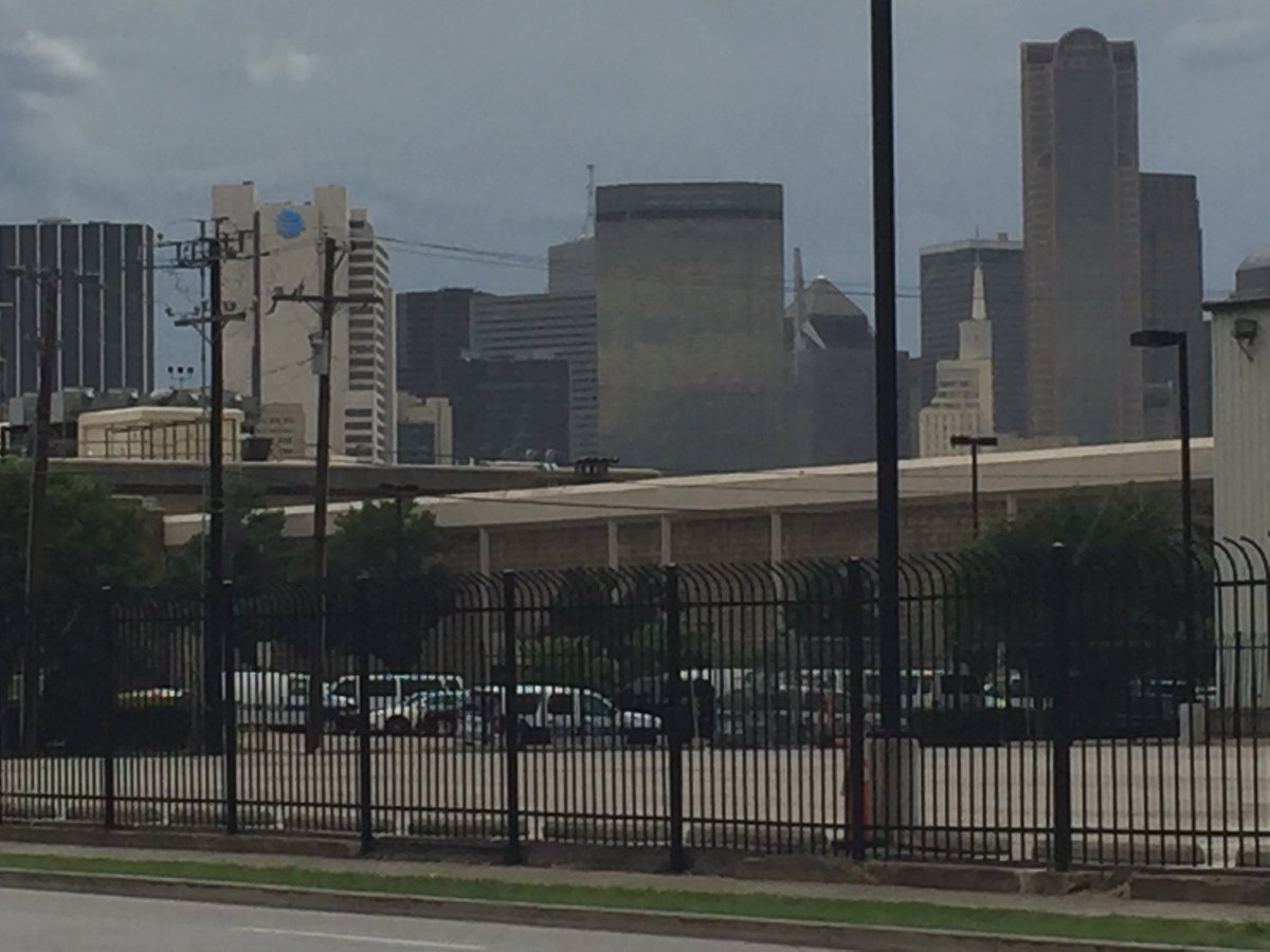 JasonWhitely's tweet photo. UPDATE: The garage being searched is the brown bldg at the bottom of the image. DPD HQ is directly S of downtown. https://t.co/O0dNUCwGA7