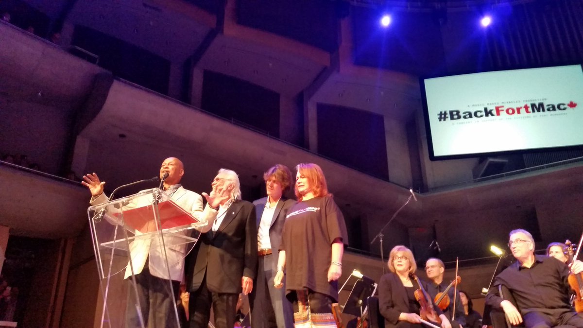 backfortmac's tweet photo. It's @spider_jones and #ronniehawkins! And @ArleneDickinson reacting to #spiderjones' storytelling... #backfortmac https://t.co/A1YwcxlSWw