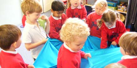 RSMLowerSchool's tweet photo. Green Shoots children enjoyed making the frog jump on lycra in time to the music yesterday #RSMmusic #groovybeat https://t.co/NELJYKXMDq