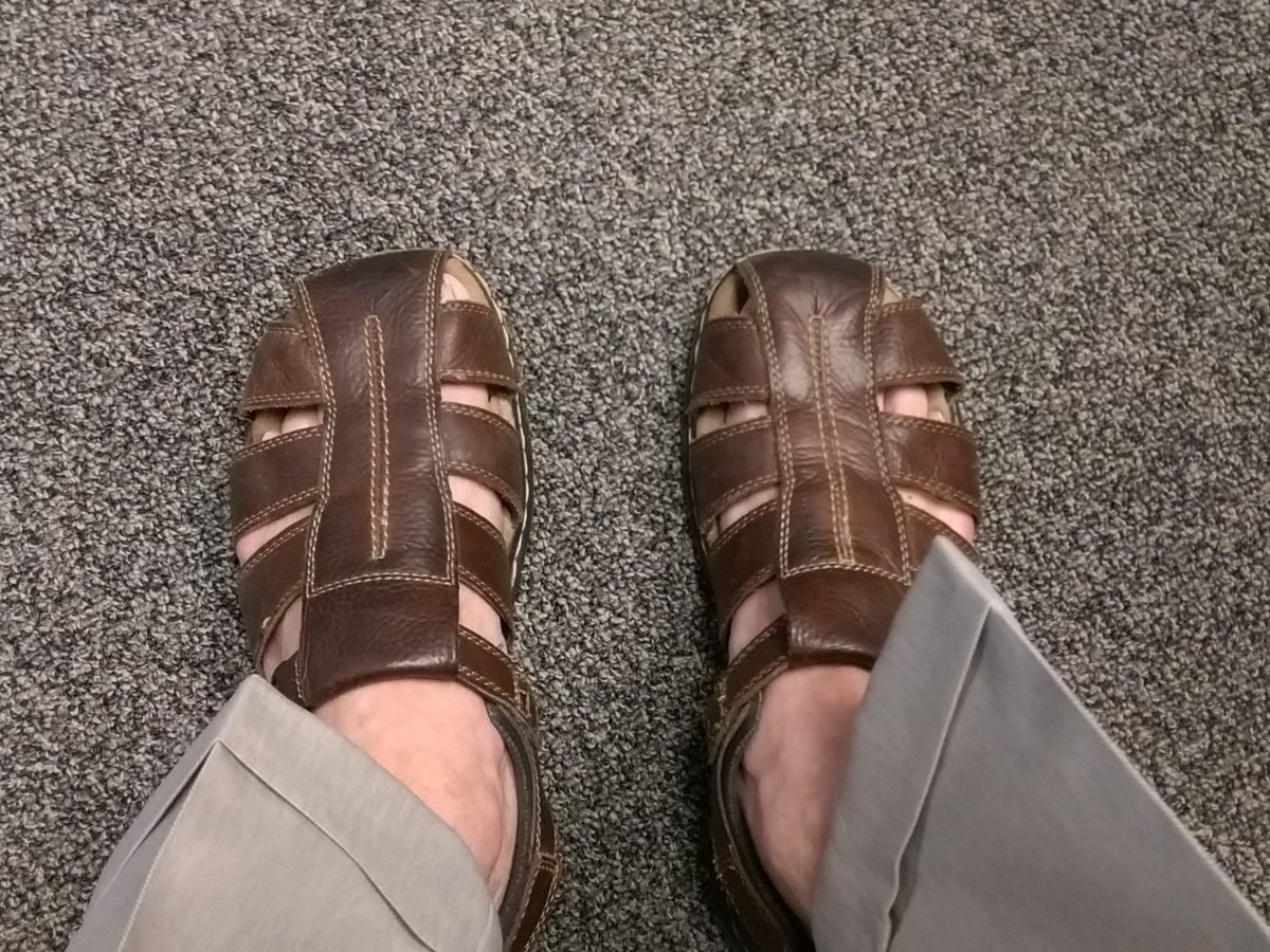 In office for client meeting. Shower: check. Hair combed, pulled back: check. Big boy clothes: check. Shoes: Well...