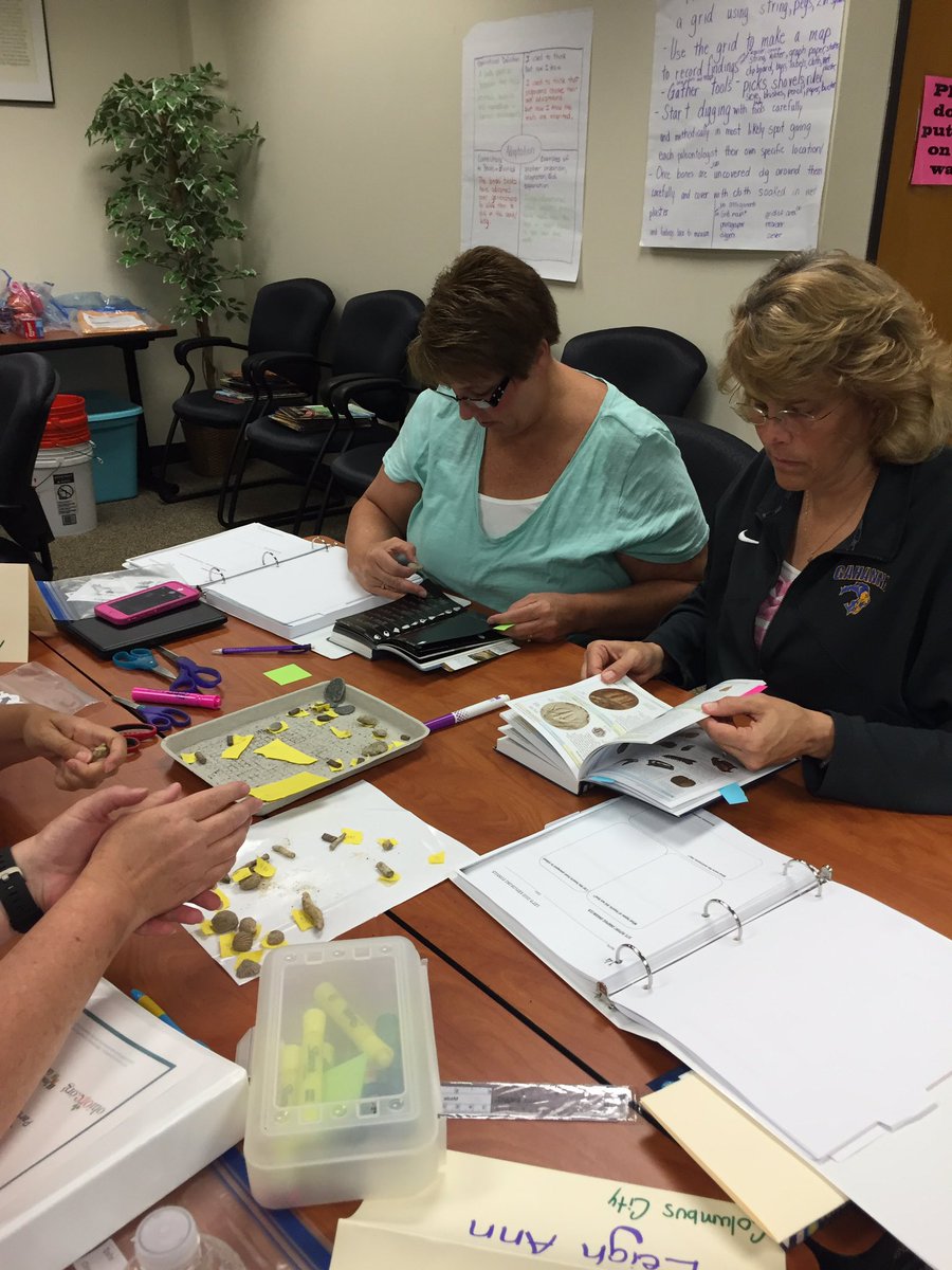 westervilleAP's tweet photo. Teachers engaged in identifying their fossils finds from their dig yesterday!  We love NFTI! #nftiscience https://t.co/SuyyCrC6R4