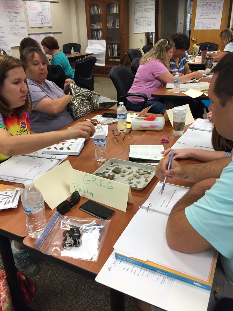 westervilleAP's tweet photo. Teachers engaged in identifying their fossils finds from their dig yesterday!  We love NFTI! #nftiscience https://t.co/SuyyCrC6R4