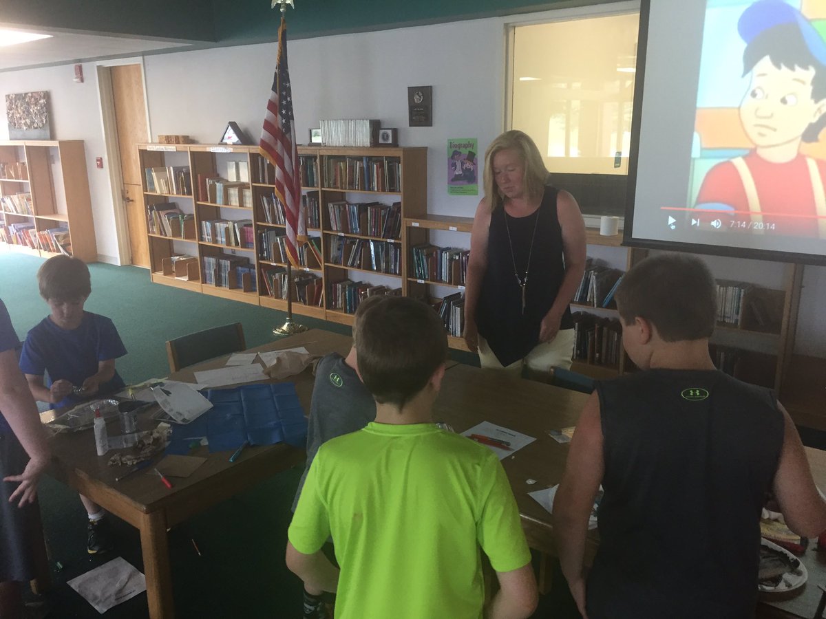WillardPenny's tweet photo. @murph12_l works with K-5 students as they complete their final boat creations during @MACSchools 1st #PBLCamp https://t.co/eKa6HPM0lq