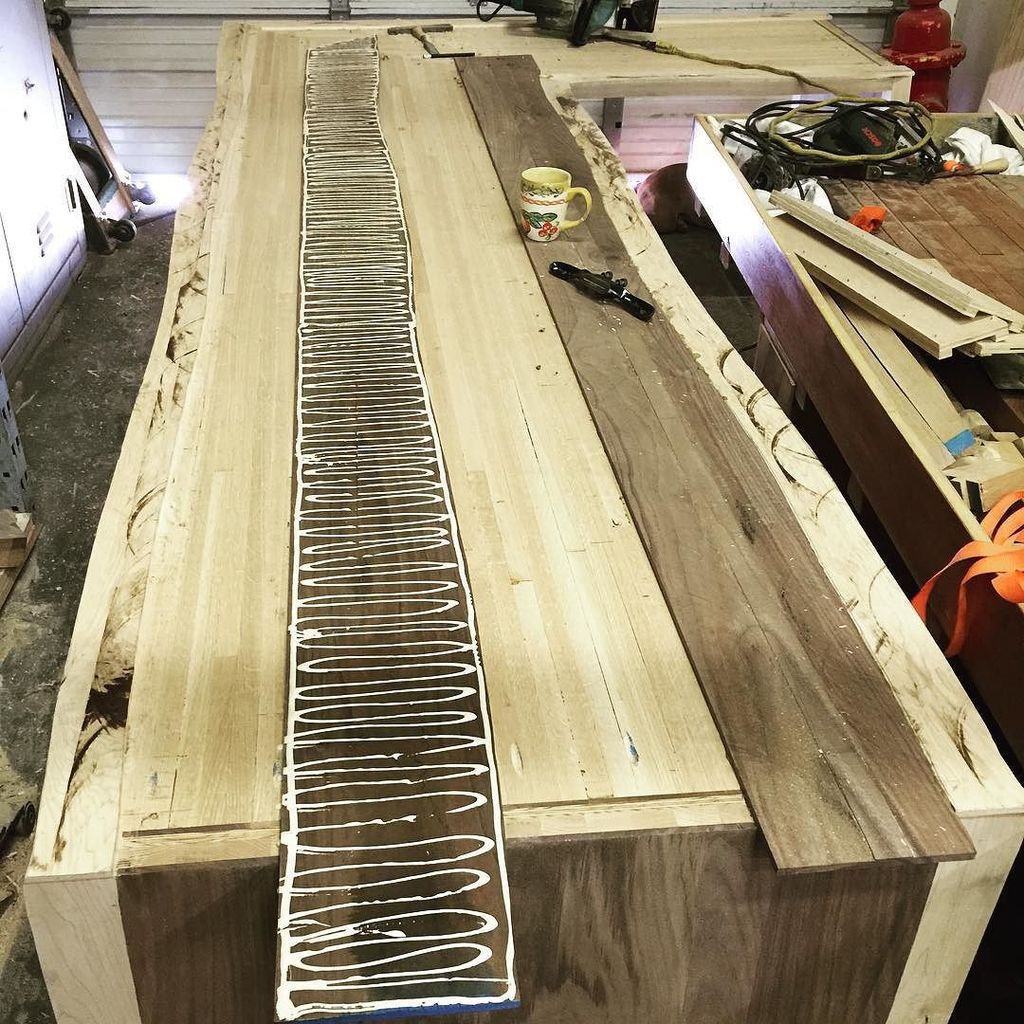 MHatvani's tweet photo. Gluing the 3/8" walnut boards on... Mad zig-zag son!!! #woodworking #finefurniture #furniture #finefurniture #finew… https://t.co/ruligiiMYG