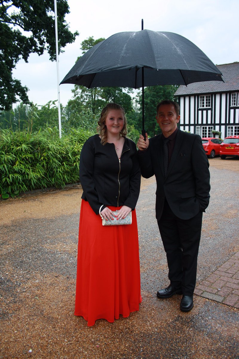 RHSCProm's tweet photo. Smiling despite the rain! #RHSCProm2016 https://t.co/xTO8MGe5Tk