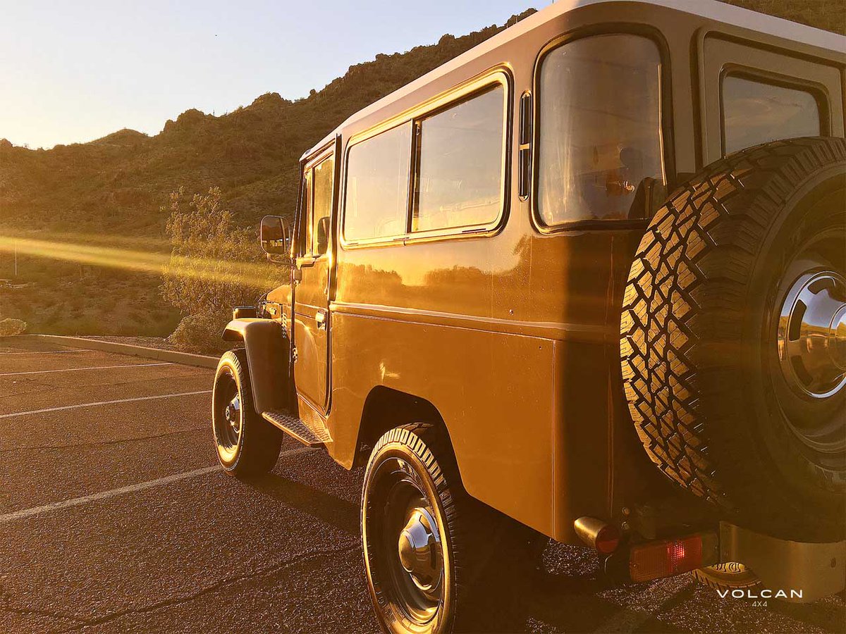 volcan4x4's tweet photo. Olivia in the western sun. Vintage Land Cruiser FJ43 (longer wheelbase than FJ40) in the desert-like olive color. https://t.co/KA6mqaqSt0
