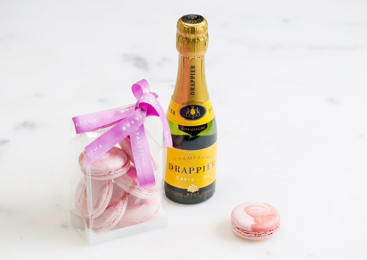 Our new strawberry and clotted cream macarons and Champagne, available until 10th July bit.ly/1X0ItXE