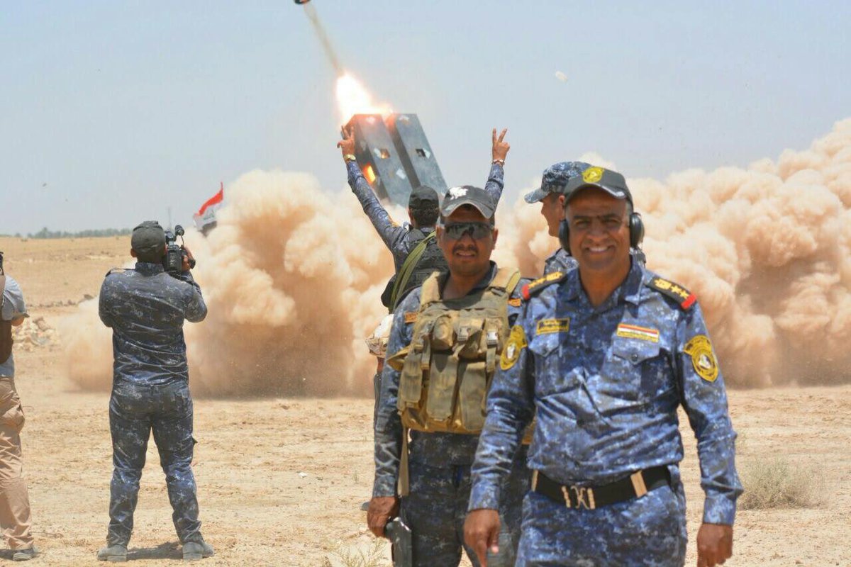 الشرطه الاتحاديه العراقيه تنصب منصات صواريخ محليه الصنع على عربات Ford F-350  CmJ_IKLWIAAil72