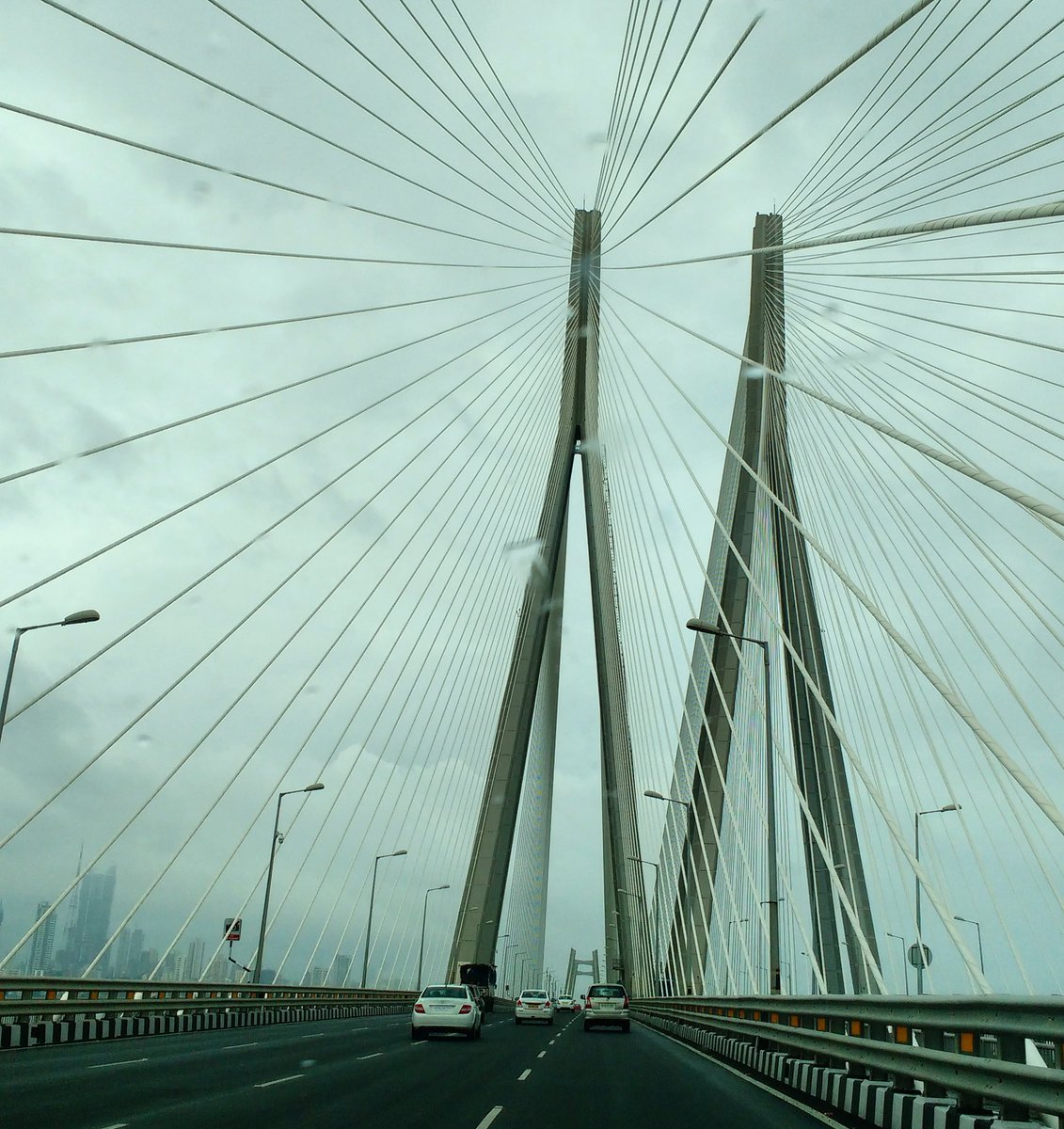 vandanakrishnan's tweet photo. The ride to work #Bombay #sealink #Monsoon #greyskies #Uber https://t.co/UR0TUYAxgK
