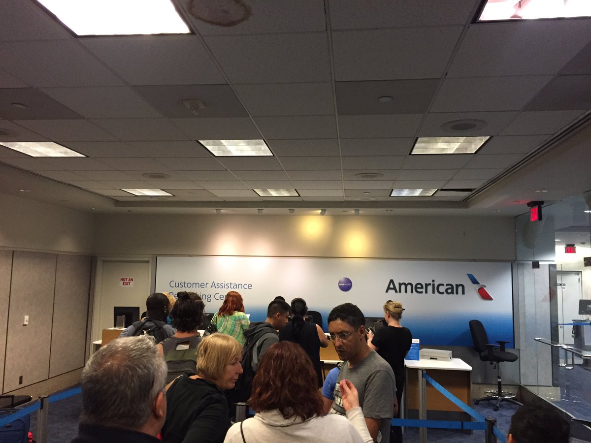 jasonhochman's tweet photo. @AmericanAir - there's a line out year service door at LAX and your employees just walked out helping us https://t.co/oVHb1g2EZV
