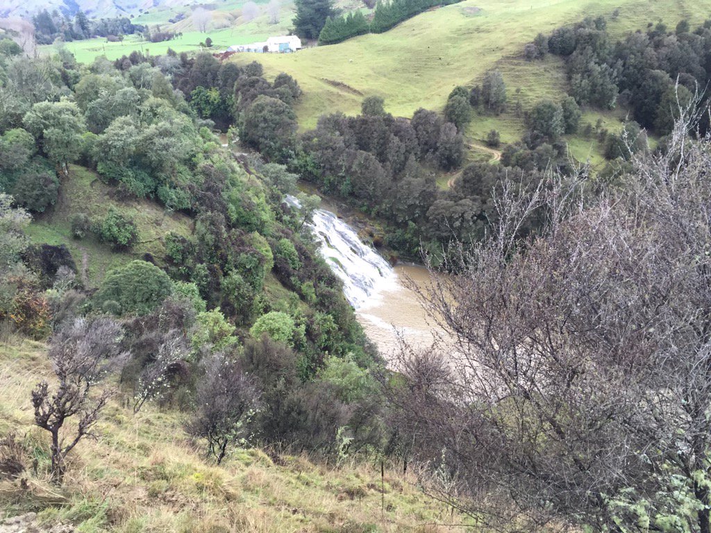 theofficenz's tweet photo. After nearly 100mls of rain the waterfall is finally at full flow https://t.co/9p6I56aJU0