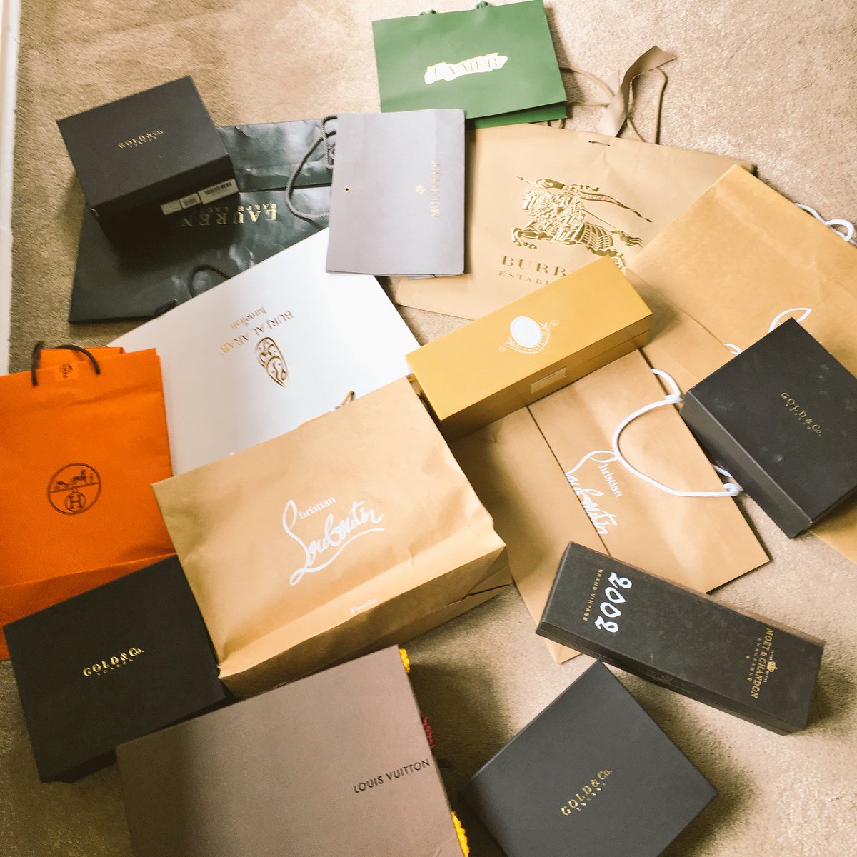 DarrJcq's tweet photo. Moving house and found these in cupboard testament to how much I like shopping @LoboutinWorld @goldandco https://t.co/IOqho2IUKS