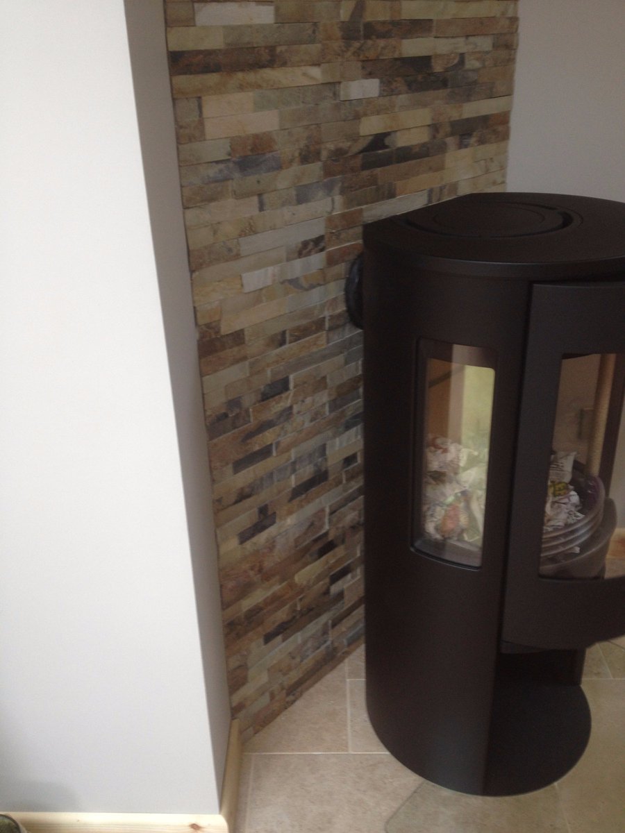 coriniumstoves's tweet photo. A recent installation of a @ConturaStoves 556:1 Style on a glass hearth #CSinstallations #CoriniumStoves https://t.co/PsisUmq1PO