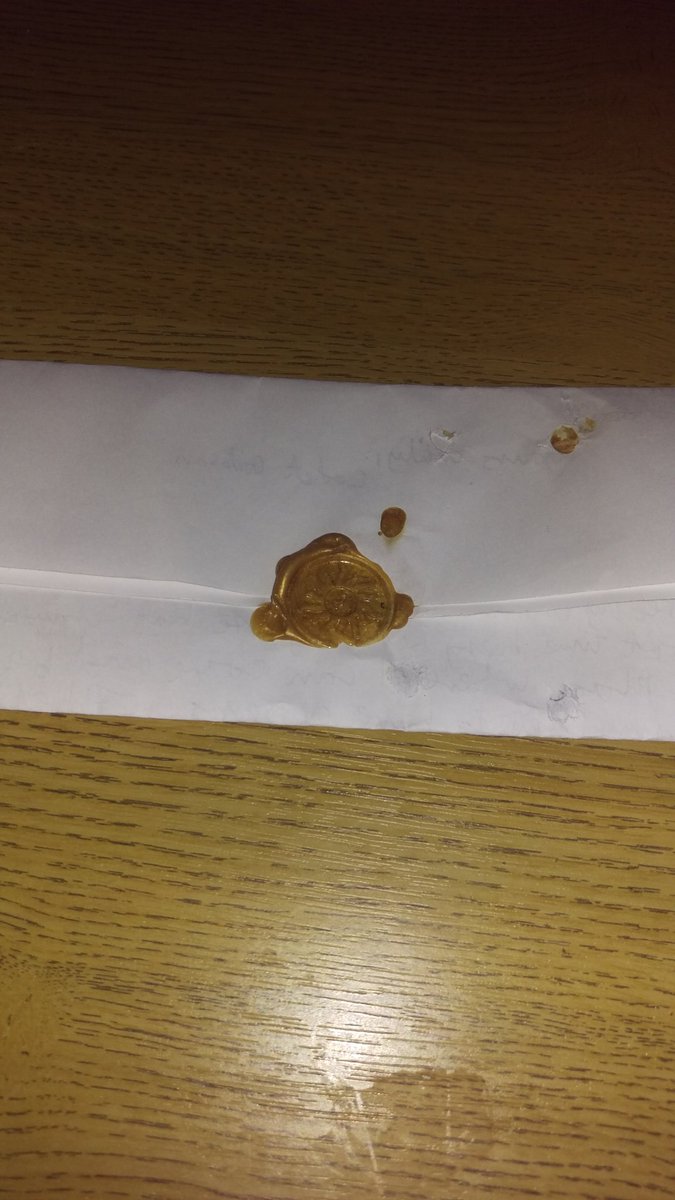 Now THAT is how you do a promotion letter, with a wax seal! #classy
