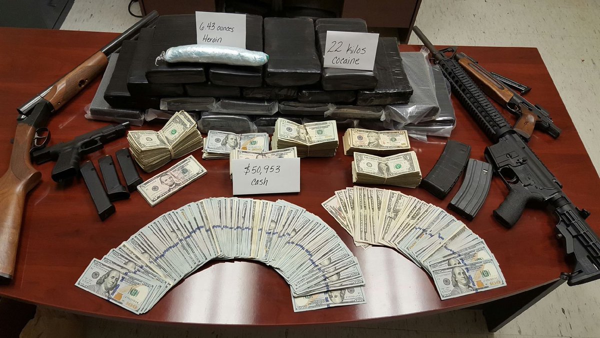 Authorities in Rockdale County arrested 4 men and seized 22 kilos of cocaine, 6.43 oz of heroin and $50,953 in cash.
