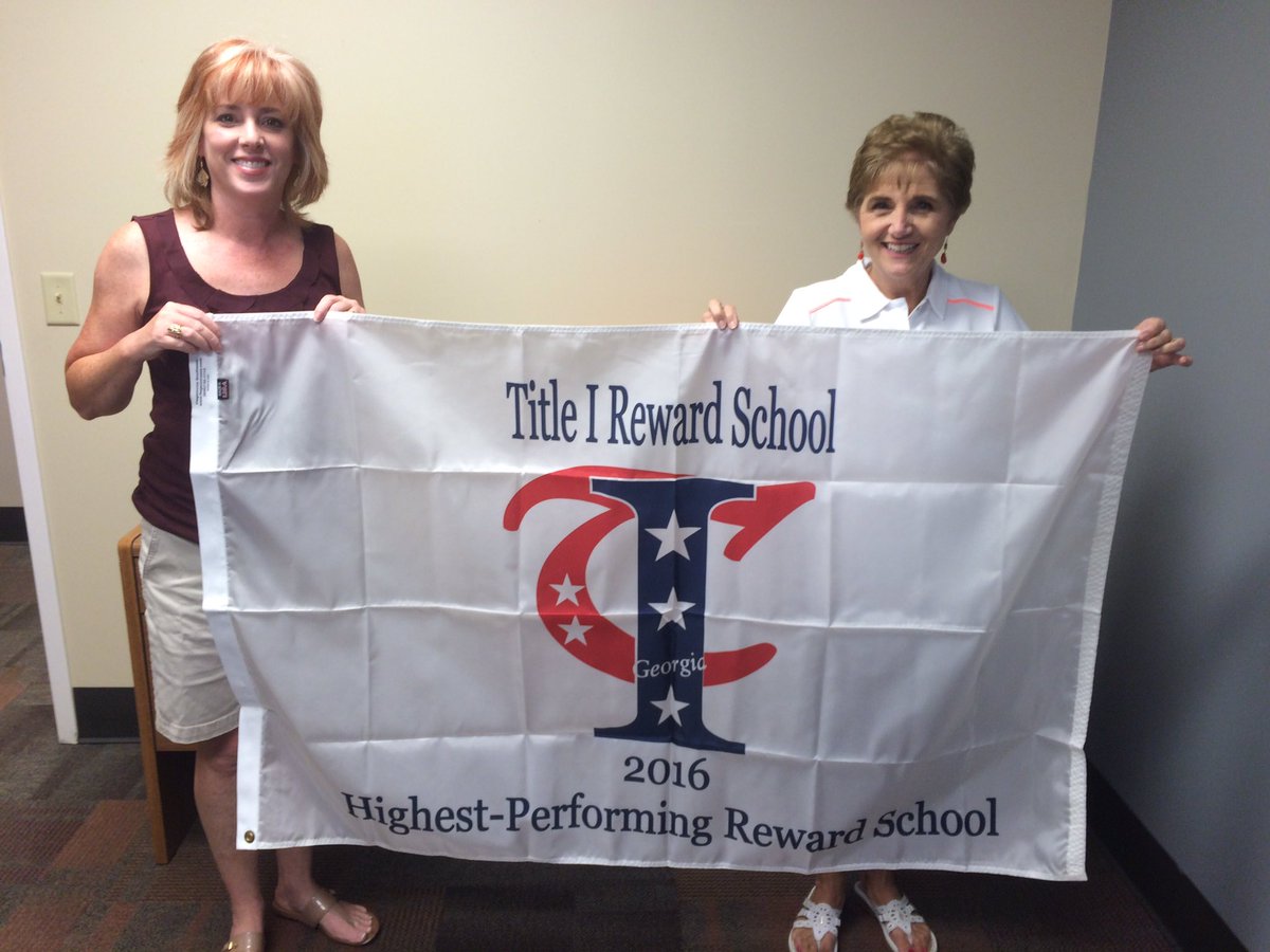 bpscubs's tweet image. The BPS title 1 highest performing flag being held by Mrs. Haynes and Mrs. Miller from the county office!