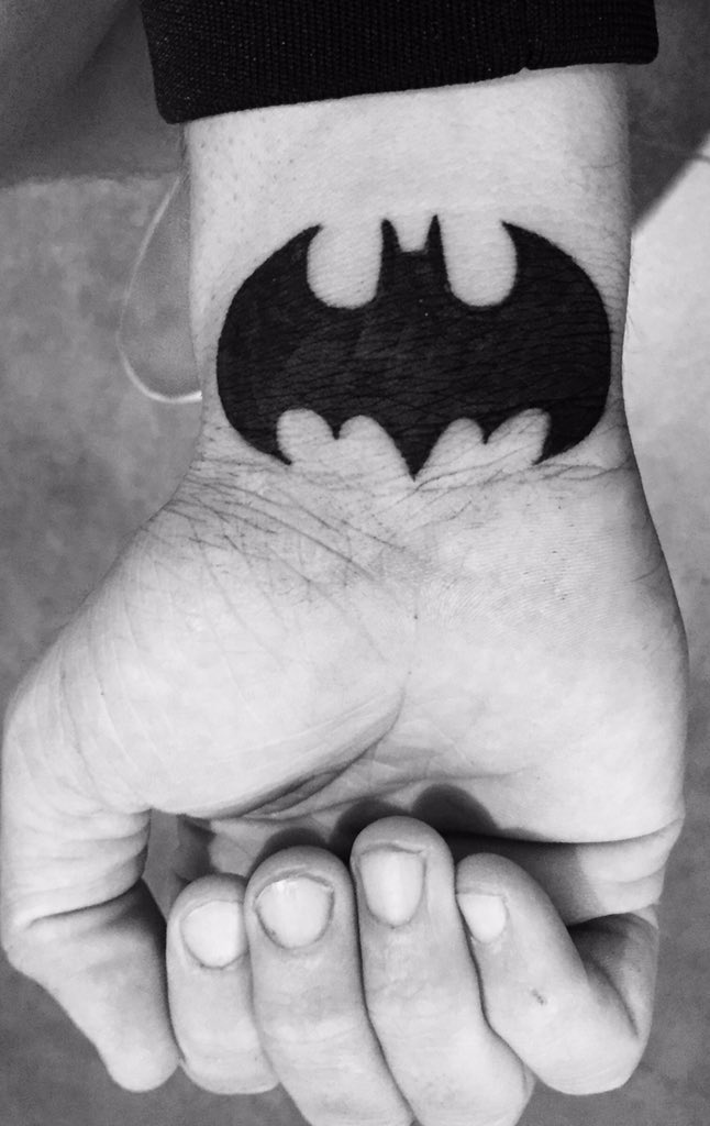 Sorry if not allowed. Here's my Batman tattoo. Is there a Superman tattoo I  could get that looks similar (the symbol but not the character with hints  toward the hero and a