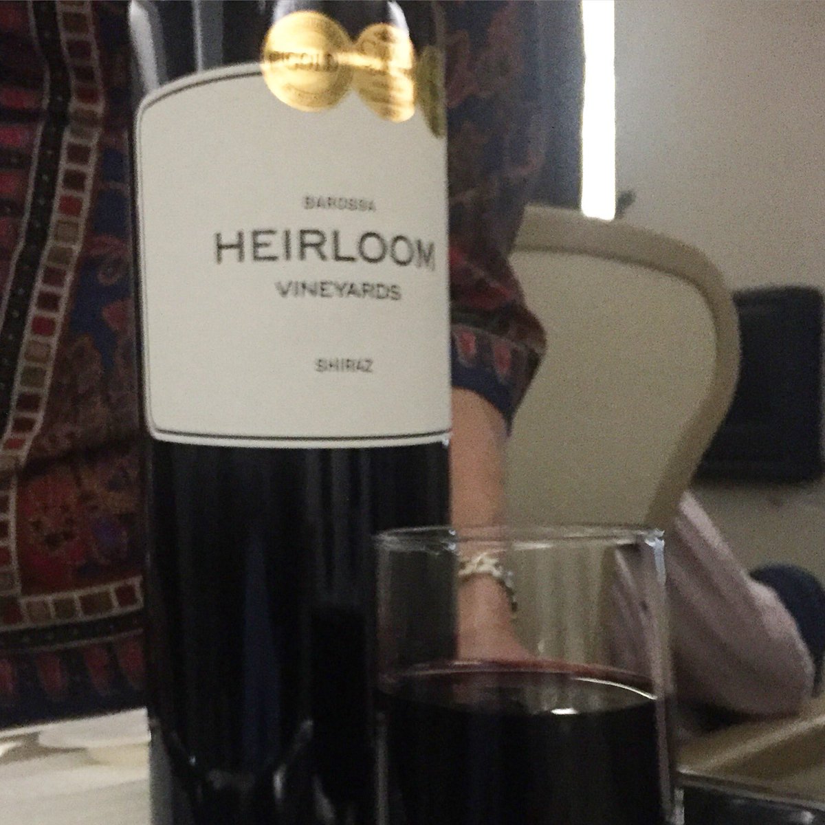 KeithConlon's tweet photo. A heartening taste of home- #Barossa @HeirloomWines Shiraz on our @SingaporeAir final leg to #Adelaide. https://t.co/vJXt3yMkyC